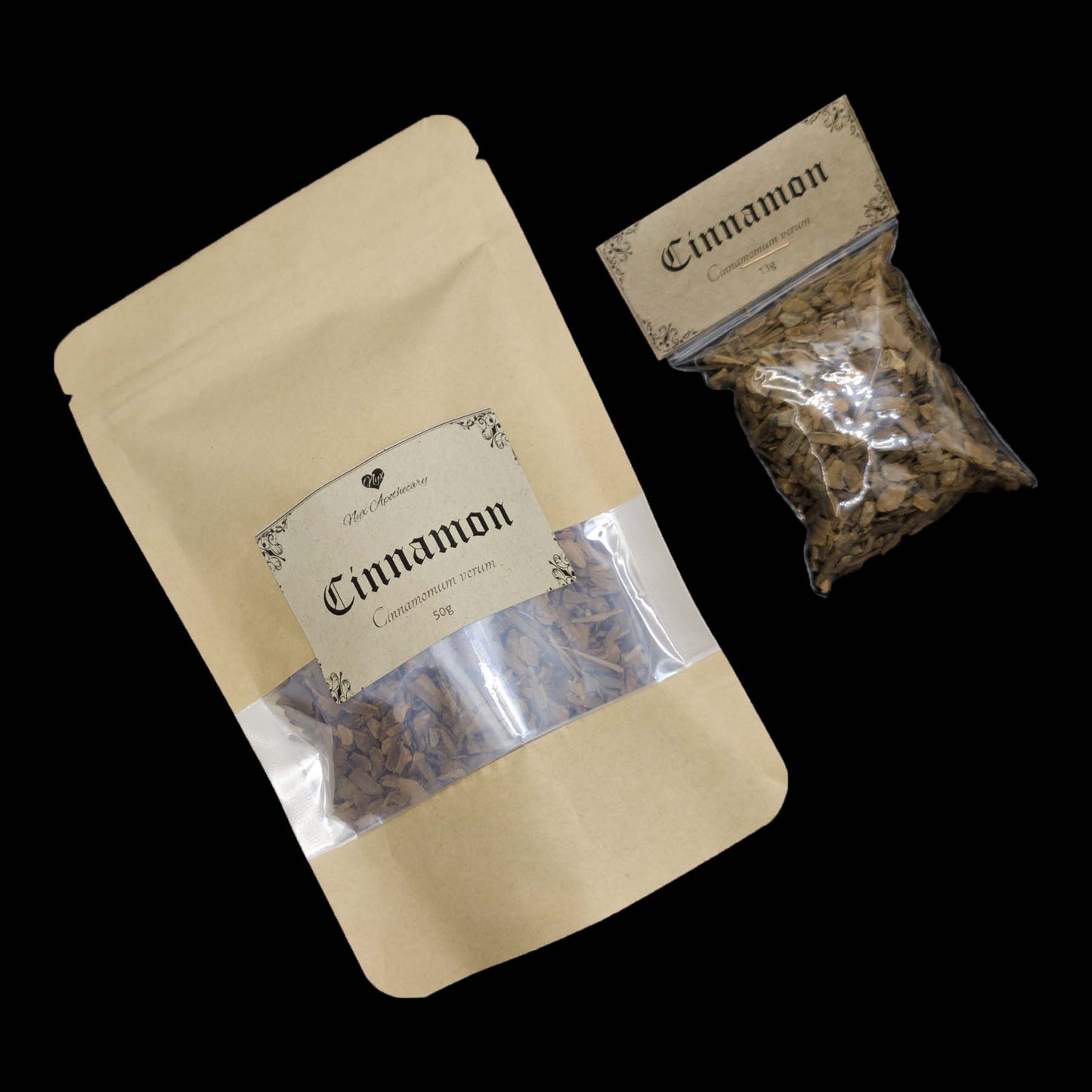 Two bags of cinnamon chips, one small and clear, the other a larger kraft bag with a clear window.