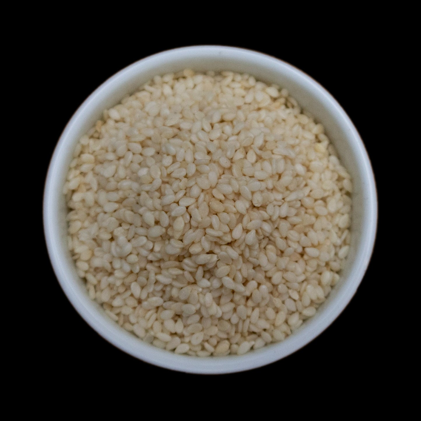 Whole pale sesame seeds
