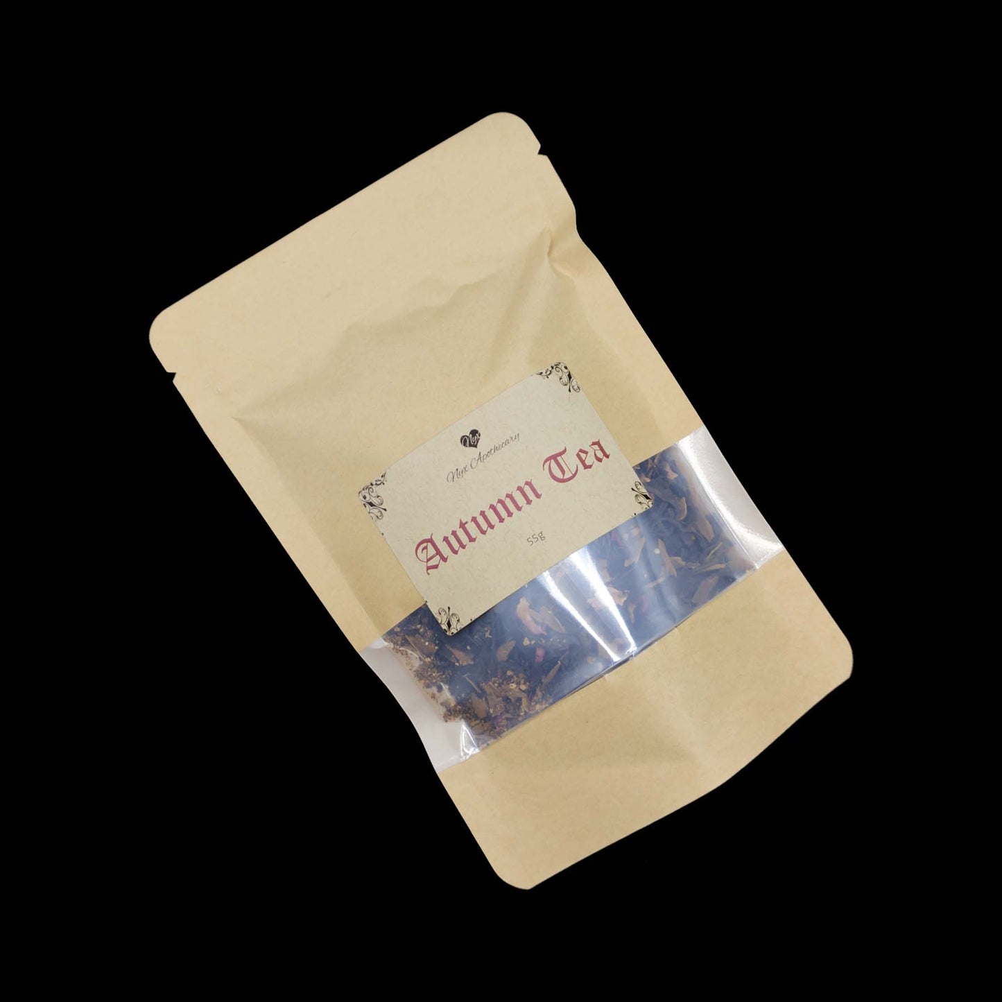 A kraft bag labelled Autumn Tea
with a clear window showing the tea