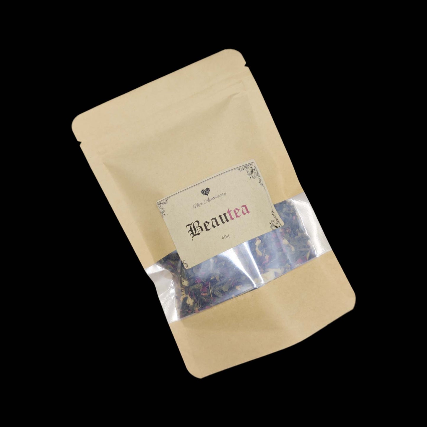 A kraft bag labelled Beautea with a clear window showing the tea