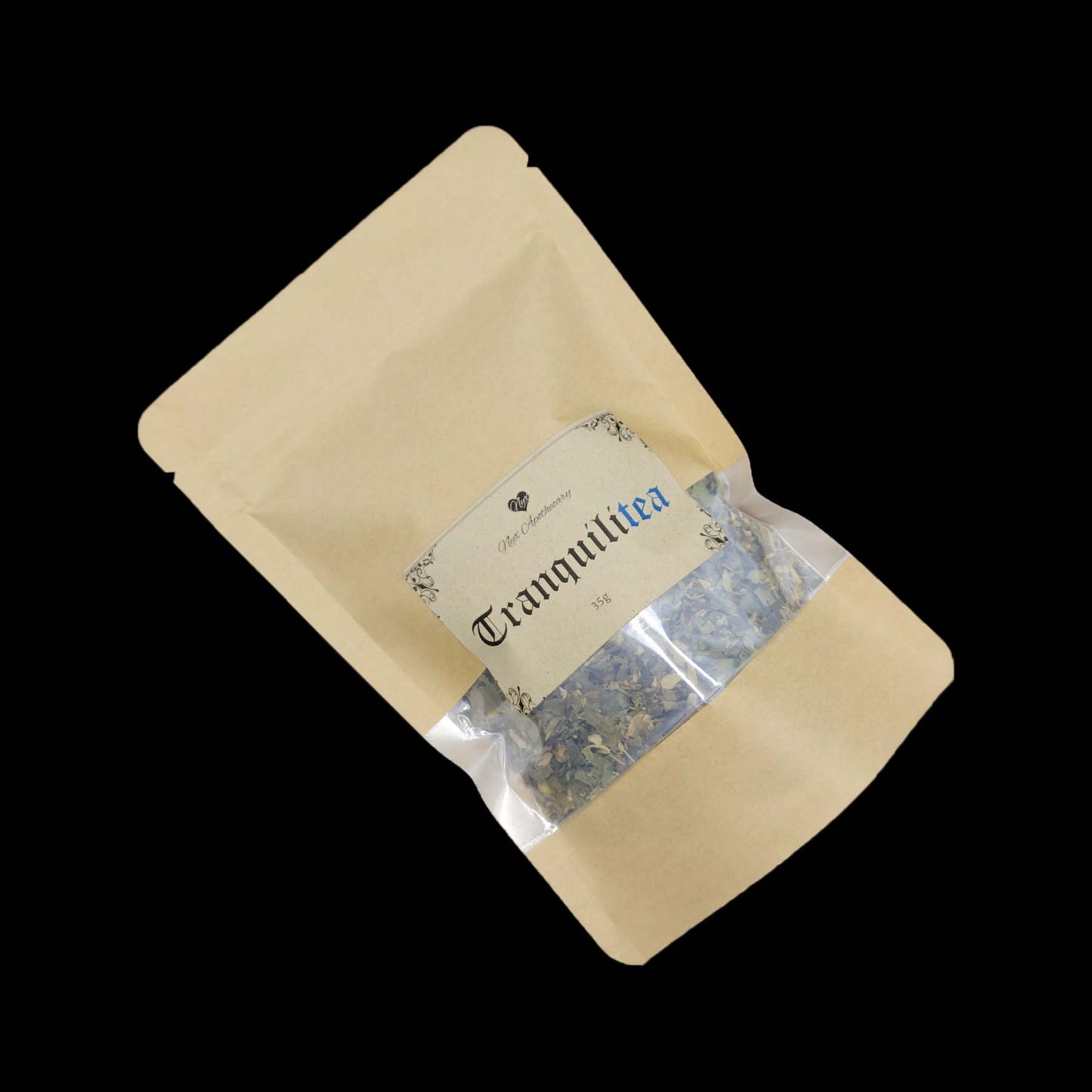 A kraft bag labelled Tranquilitea with a clear window showing the tea