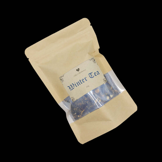 A kraft bag labelled Winter Tea with a clear window showing the tea