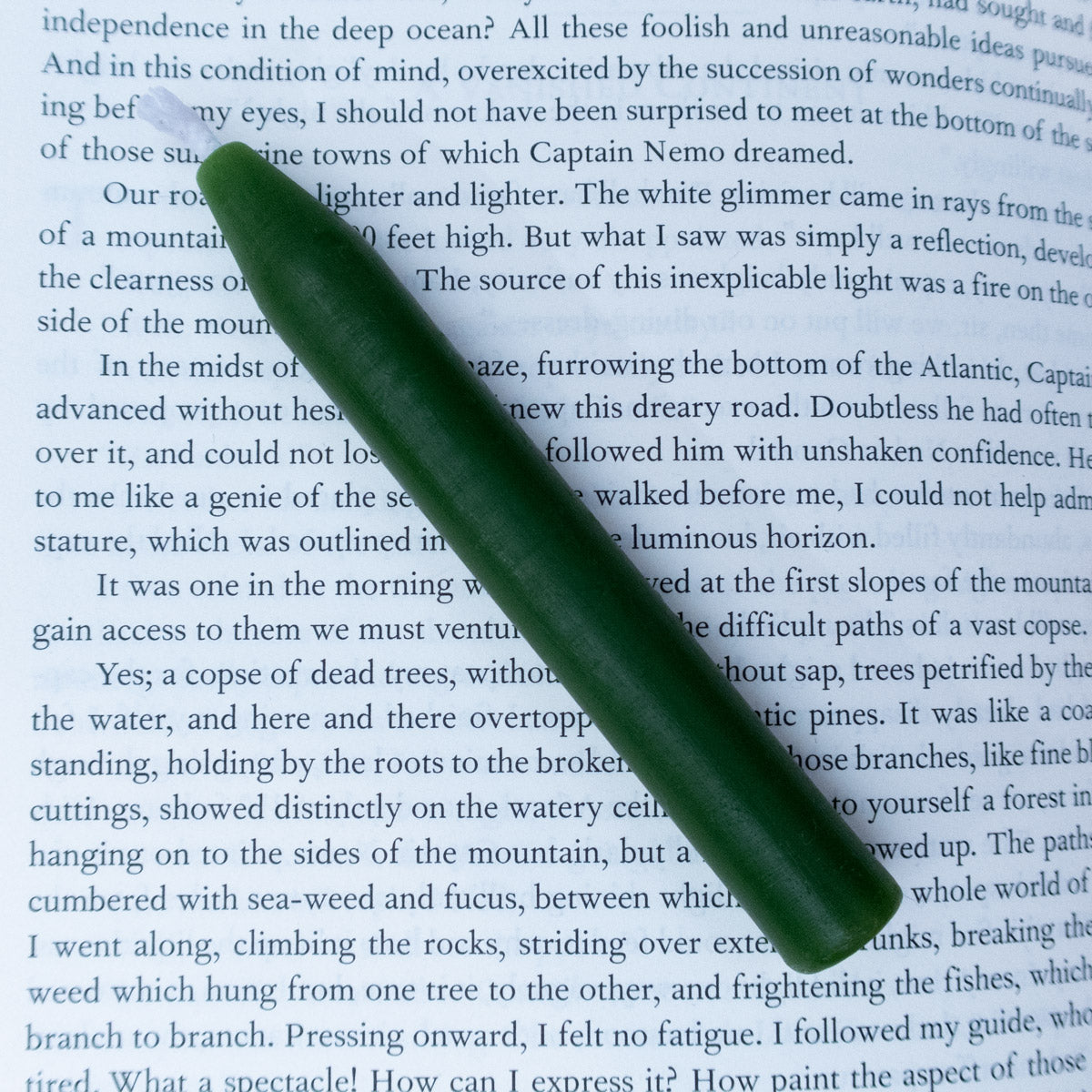 A green beeswax chime candle