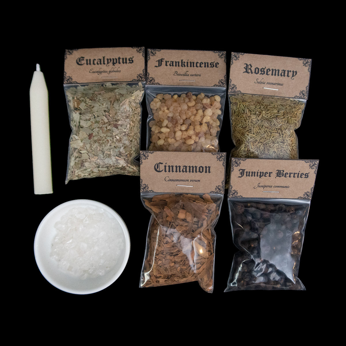 A pale chime candle, small bowl of clear quartz crystal chips, and 5 bags of herbs with Victorian-apothecary-style brown labels at the top give the common and Latin names